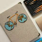 Блокнот с апликацией велосипед континенты